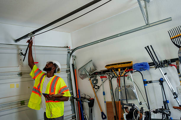 Professional Garage Door Panel Replacement technician working in Wellsboro, PA